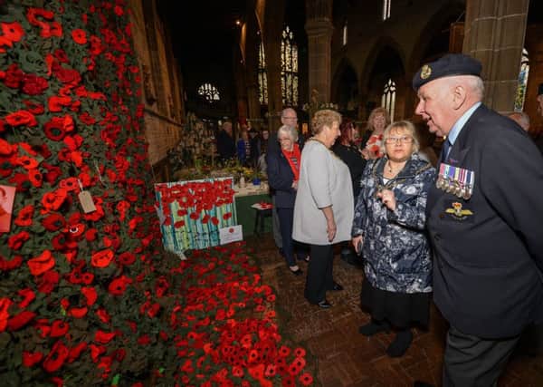 Official opening of handmade poppy display at Chesterfield Parish Church
