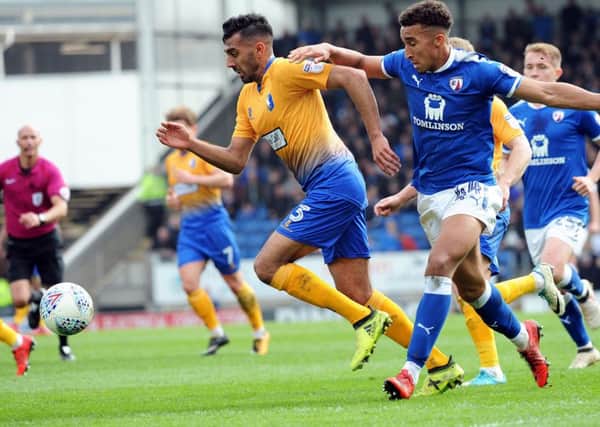 Chesterfield FC v Mansfield Town.
Mal Benning heads towards goal before netting the Stags' second half goal.
