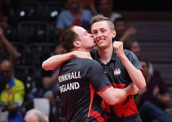 GOLD COAST, AUSTRALIA - APRIL 14:  (L-R) Paul Drinkhall and Liam Pitchford of England celebrate after defeating Sharath Achanta and Sathiyan Gnanasekaran of India during the Men's Doubles Gold Medal Table Tennis match on day 10 of the Gold Coast 2018 Commonwealth Games at Oxenford Studios on April 14, 2018 in Gold Coast, Australia.  (Photo by Matt Roberts/Getty Images)