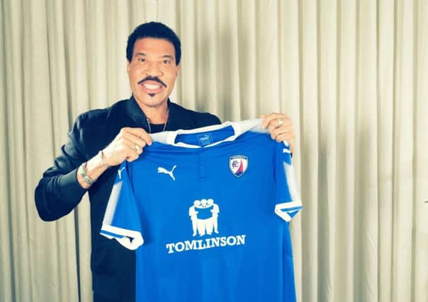 Global superstar Lionel Richie is pictured with a Chesterfield FC shirt ahead of his concert at the Proact Stadium on June 21.