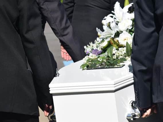 Funeral payments help cover the costs of a coffin, among other things.