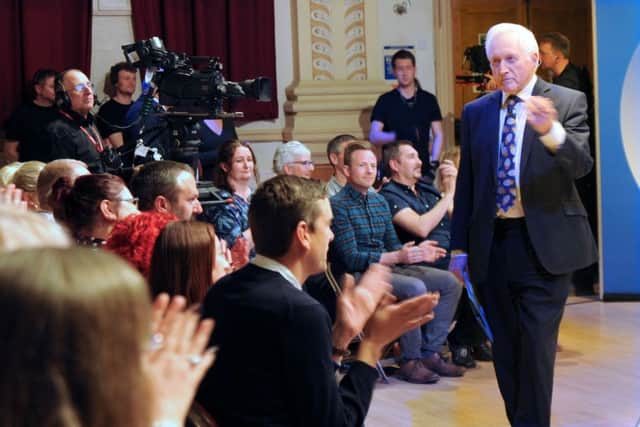 Question Time presenter David Dimbleby speaks to audience members before the start of the show. Picture by Anne Shelley.