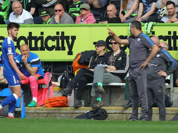 Jack Lester has words with Joe Rowley after substituting the youngster at Forest Green.
