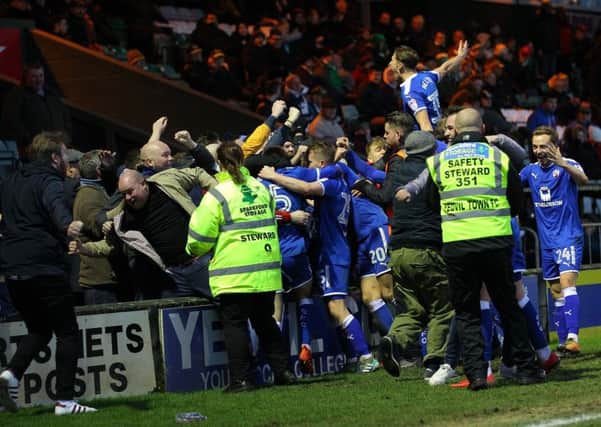 Picture by Gareth Williams/AHPIX.com; Football; Sky Bet League Two; Yeovil Town v Chesterfield FC; 20/01/2018 KO 15.00; Huish Park; copyright picture; Howard Roe/AHPIX.com; Players and fans celebrate Kristian Dennis' winner at Yeovil