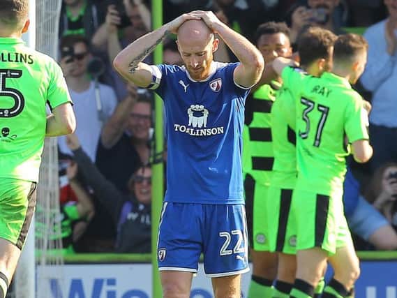 Drew Talbot holds his head in his hand as Chesterfield's fate is sealed.