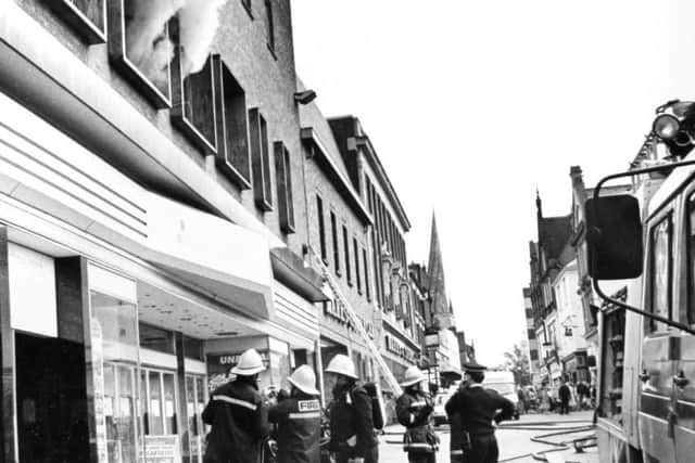 Firefighters at the scene of the Littlewoods blaze.