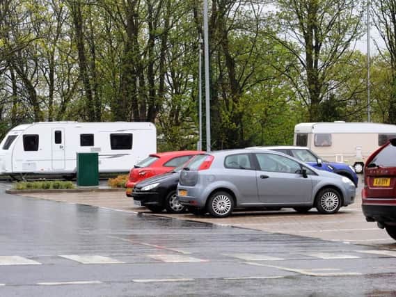 Travellers at the Queen's Park Sports Centre car park.