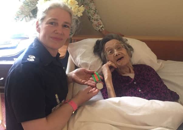 Blitz fire service veteran Doreen Maltz, 95, now a resident of Burton Closes Hall Care Home in Bakewell, has been presented with the Defence Medal for her efforts in London during the Second World War by local fire officer Alyson Hill.