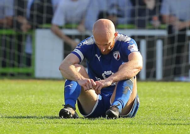 A devastated Drew Talbot after the Spireites' defeat at Forest Green. Picture by Gareth Williams/AHPIX.com.