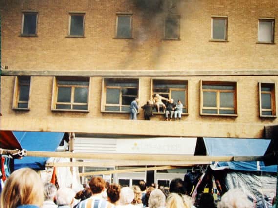 Some shoppers climbed out of the windows to escape the fire