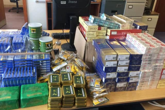 The illegal cigarettes and tobacco which were seized.