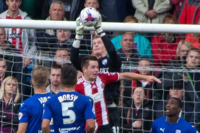 Chesterfield vs Sheffield United - Myles Wright takes the ball under pressure Pic By James Williamson