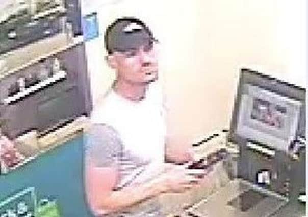 Police want to talk to this man in relation to a fraud in Chesterfield's Asda store