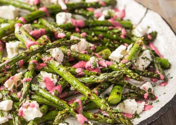 Griddled asparagus with feta and beetroot dressing. Photo courtesy of www.britishasparagus.com