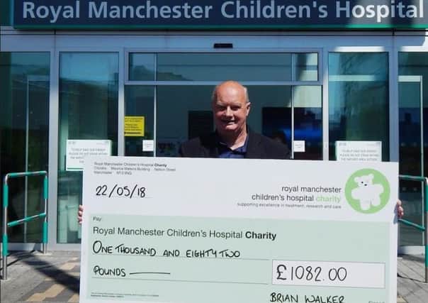 Brian Walker presenting the cheque to the hospital.