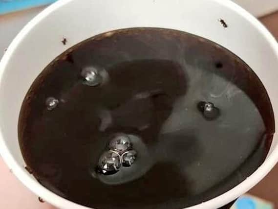 Ants in the drink ordered from the KFC drive-thru in Chesterfield. Contributed picture.