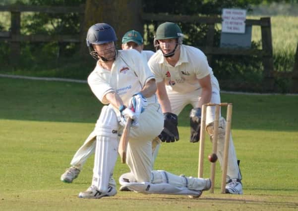Captain Dan Moss on his way to an unbeaten half-century to save the day for Holmewood. (PHOTO BY: Carl Jarvis)