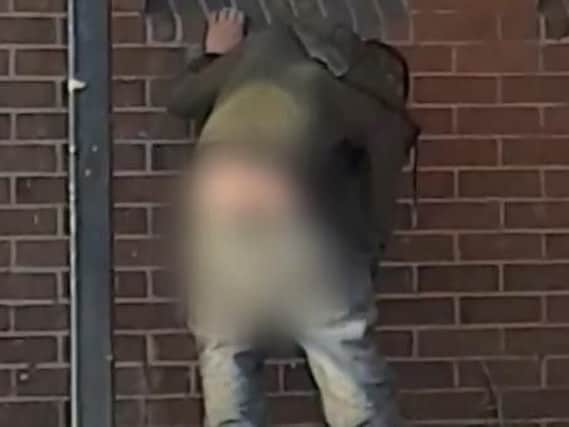 The man was caught on video with his trousers down
